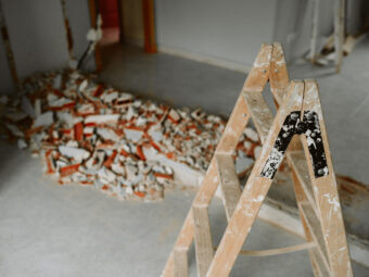 ladder and debris at home construction site. Home renovation