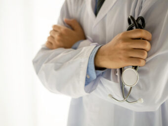 Medical physician doctor man over white background.